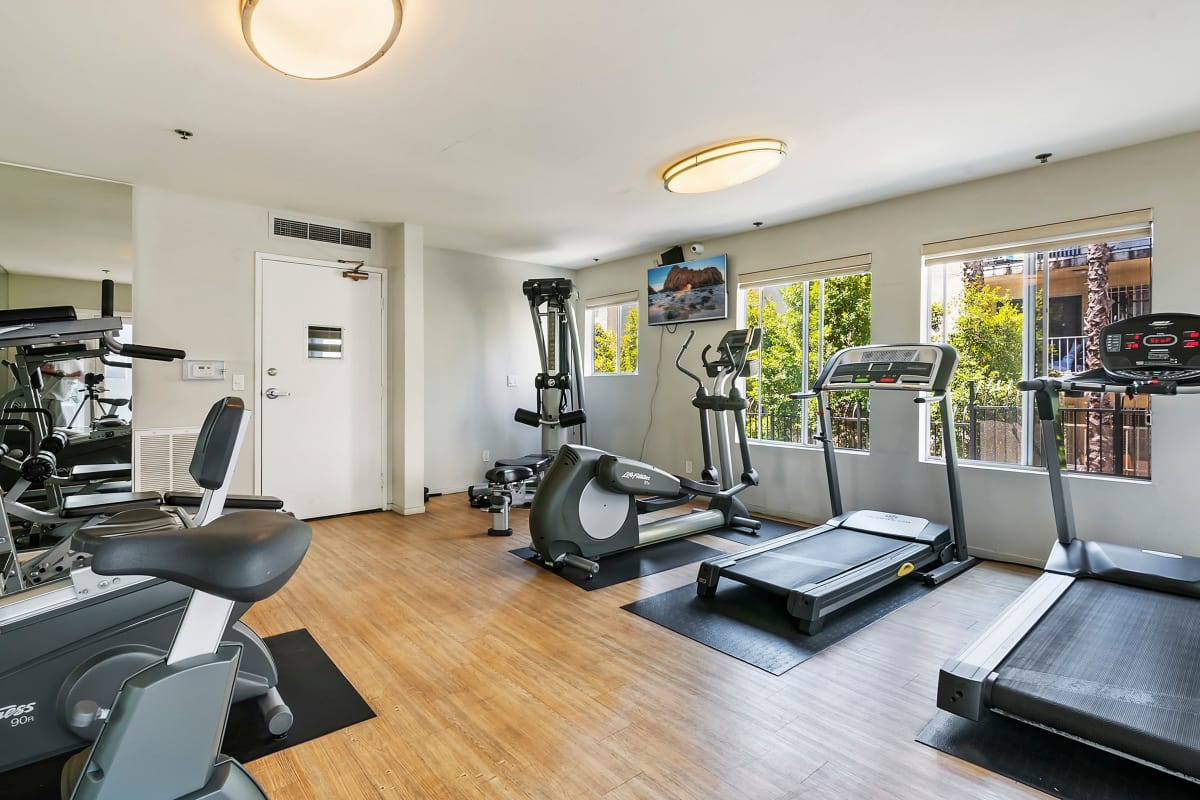 Well equipped fitness center at Kingsley Drive Apartments, Los Angeles, California