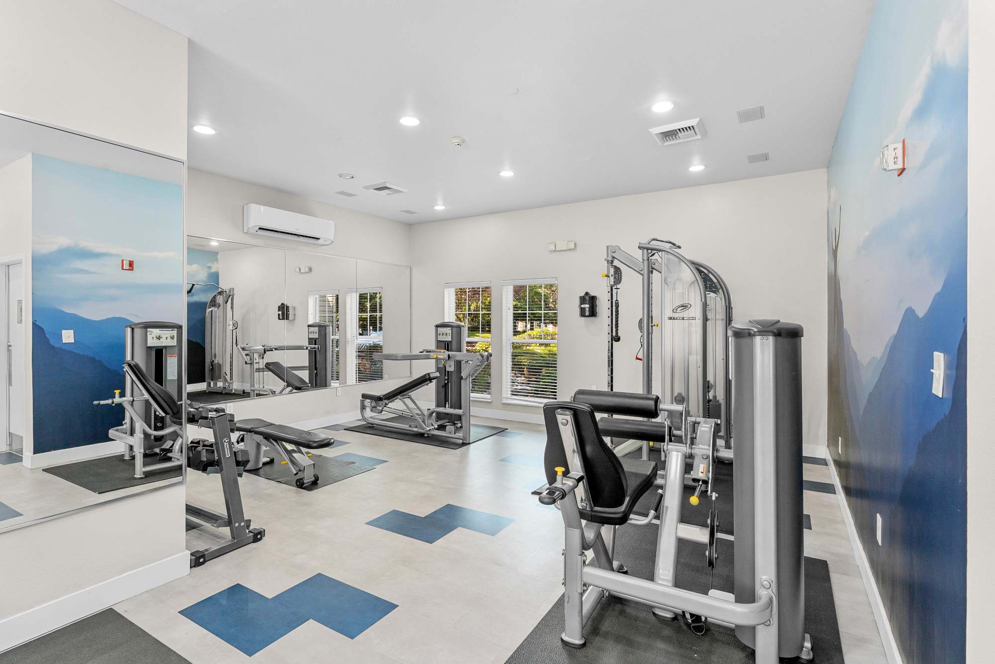 Well-equipped fitness center at Pebble Cove Apartments in Renton, Washington