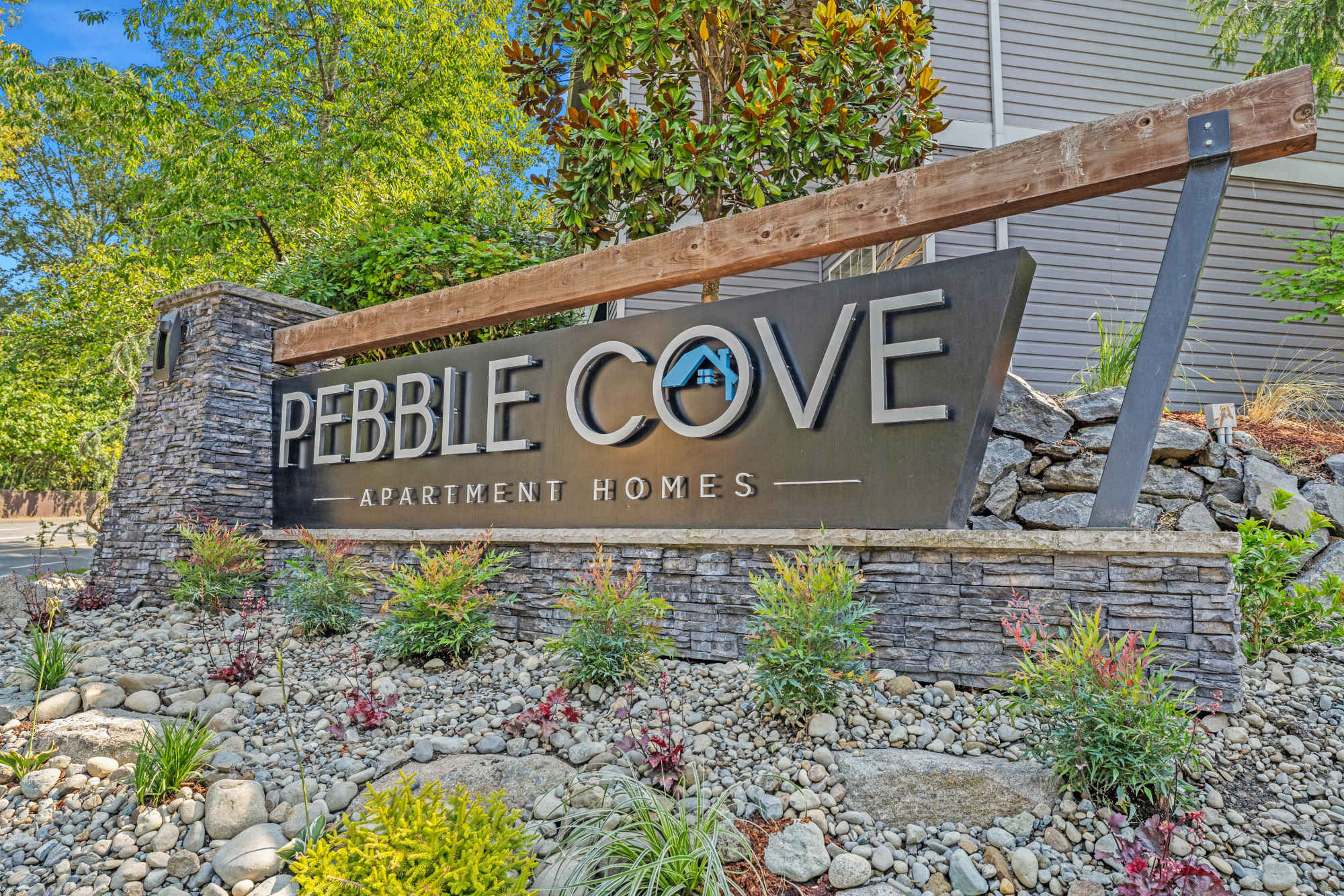 Monument sign at Pebble Cove Apartments in Renton, Washington