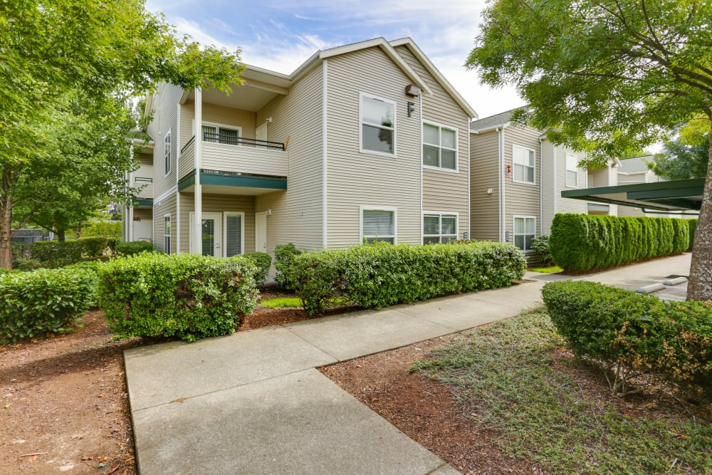 A walkway around the building at The Landings at Morrison Apartments in Gresham, Oregon