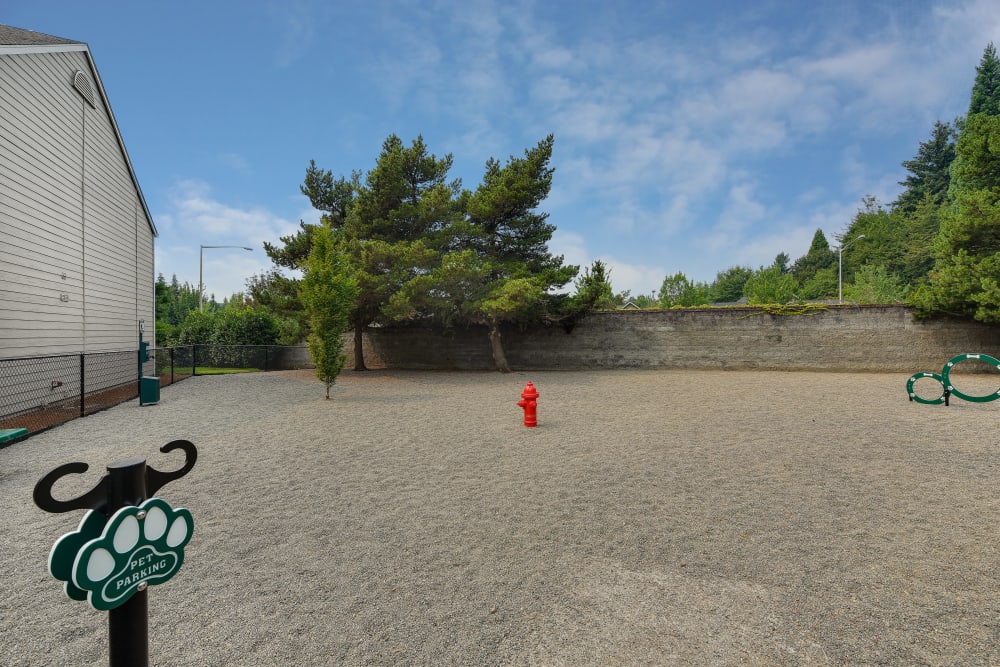 Outdoor park for dogs to run around in at Carriage House Apartments in Vancouver, Washington