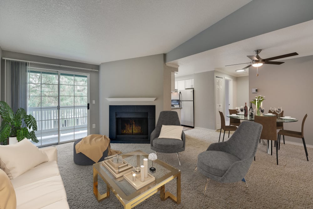 Spacious living room with a fireplace at Walnut Grove Landing Apartments in Vancouver, Washington