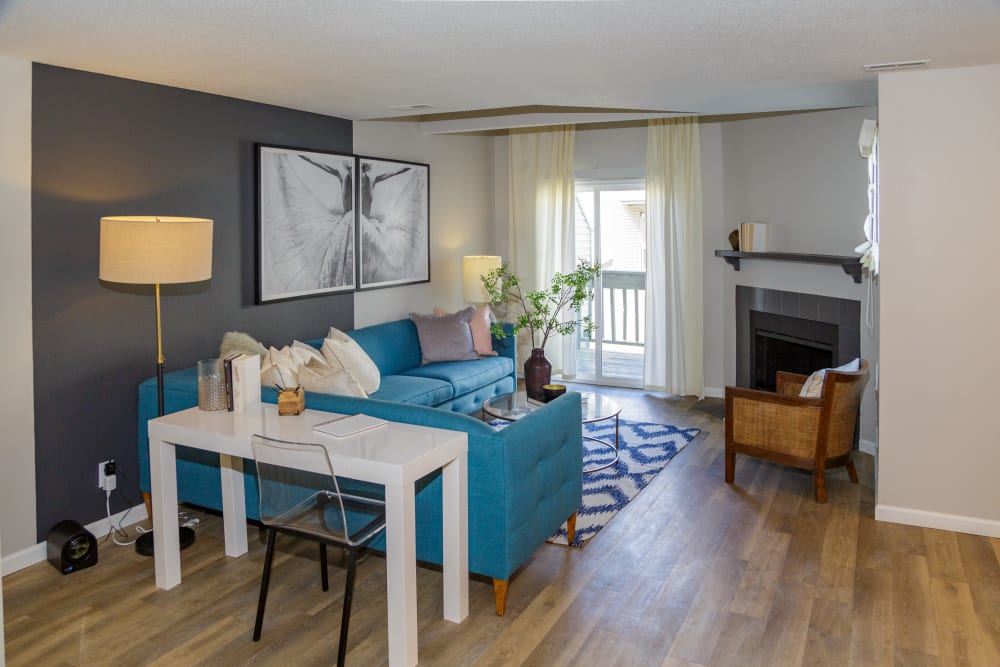 Beautiful living room with lots of natural lighting at Metro on 5th in Saint Charles, Missouri