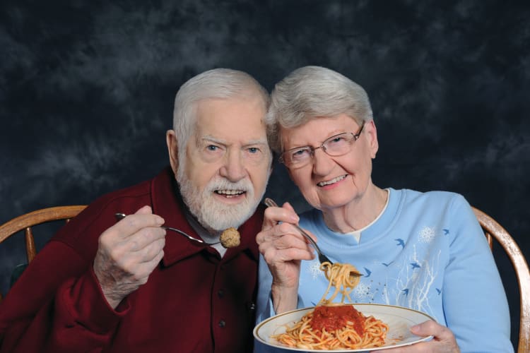 Elderly couple having dinner at Arbour Square of Harleysville
