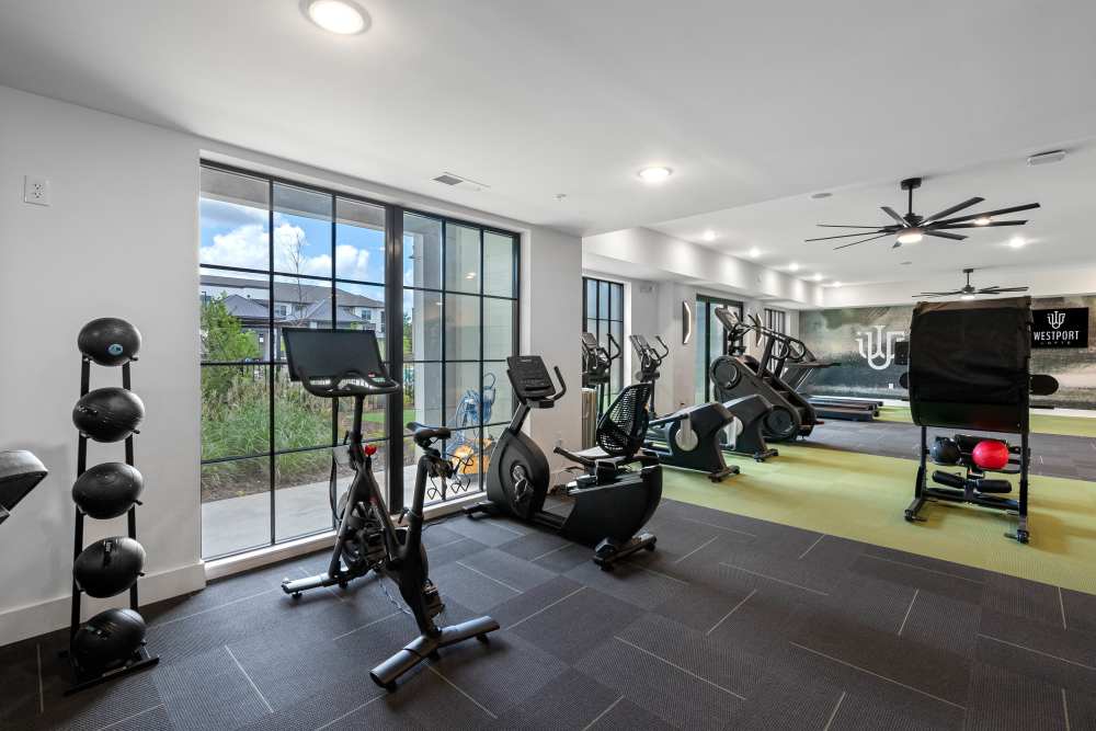 Gym with equipment at Westport Lofts in Belville, North Carolina