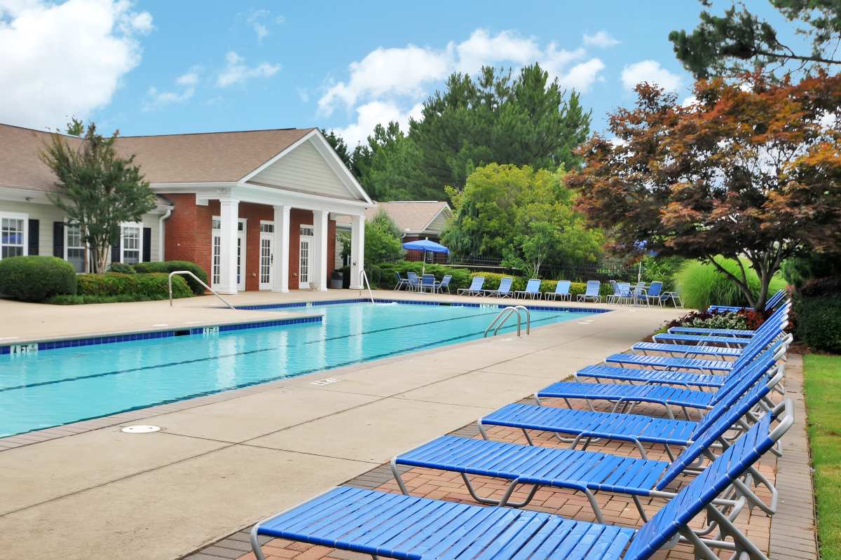 Swimming pool and lounge chairs at Cherokee Summit Apartments in Acworth, Georgia