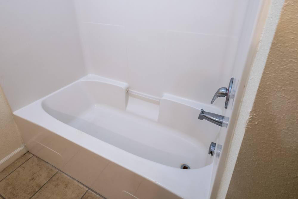 Serene bathroom retreat featuring a clean, modern tub at Adobe Ranch in Borger, Texas.
