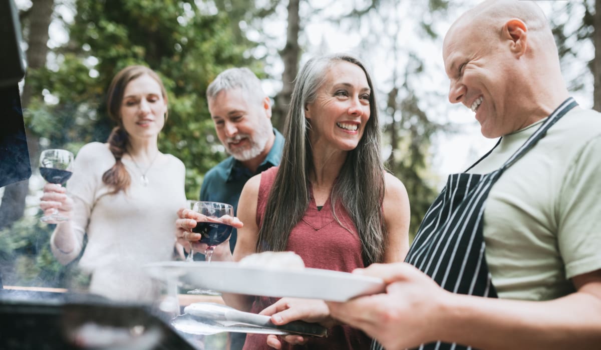 Residents enjoy a barbeque at Acclaim at Cary Pointe, Cary, North Carolina 