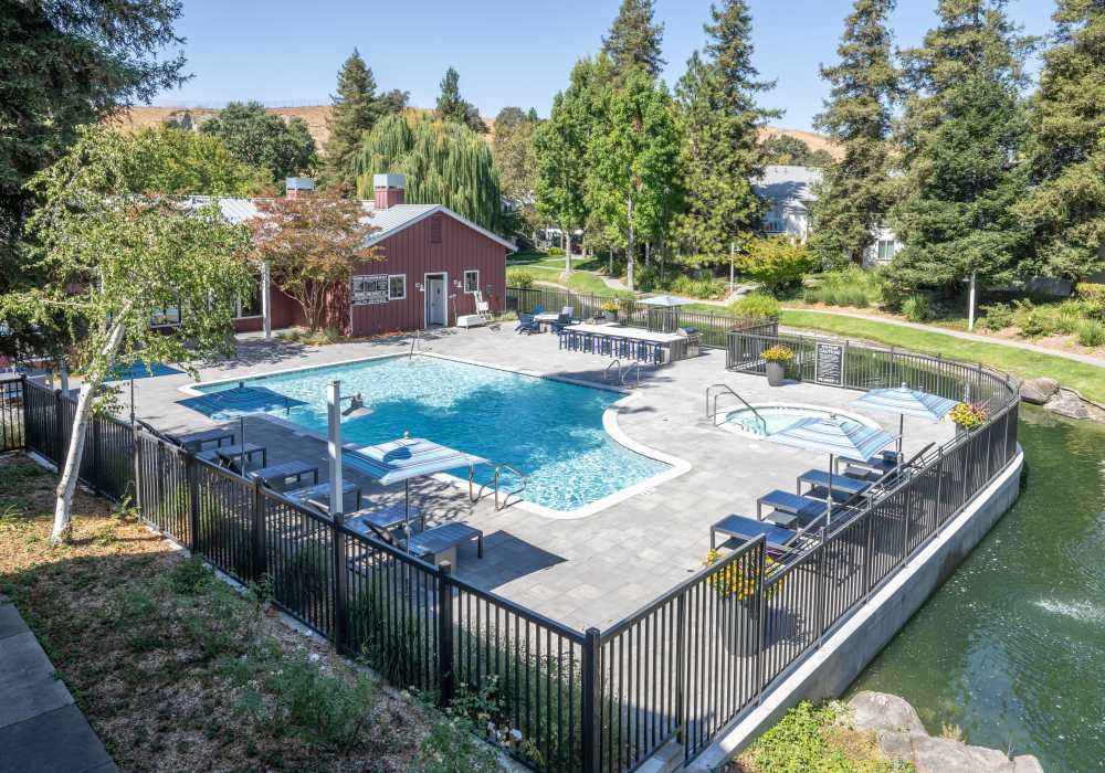 Aerial view of a pool at Cotton Wood Apartments in Dublin, California