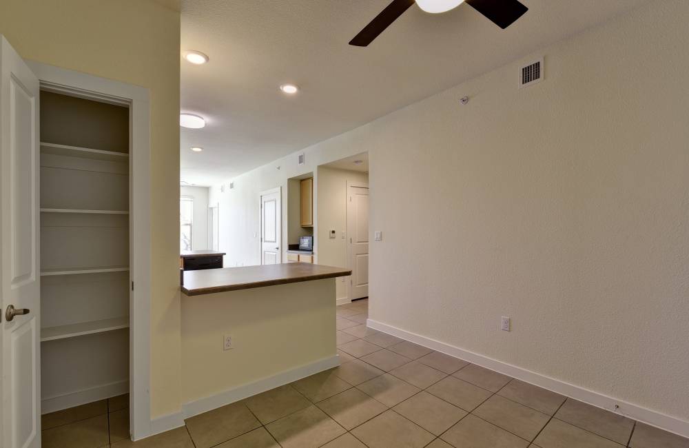Living room with shelves at Homestead Oaks Apartments in Austin,Texas
