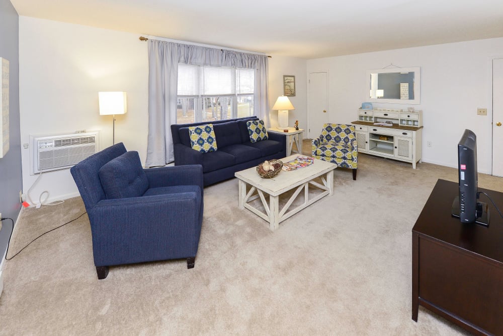 Living room in a model home at Eatoncrest Apartment Homes in Eatontown, New Jersey