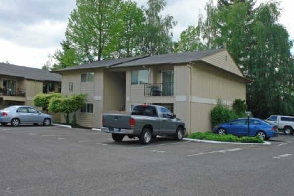 View of apartment with parking area at Sagewood Estates in Portland, Oregon