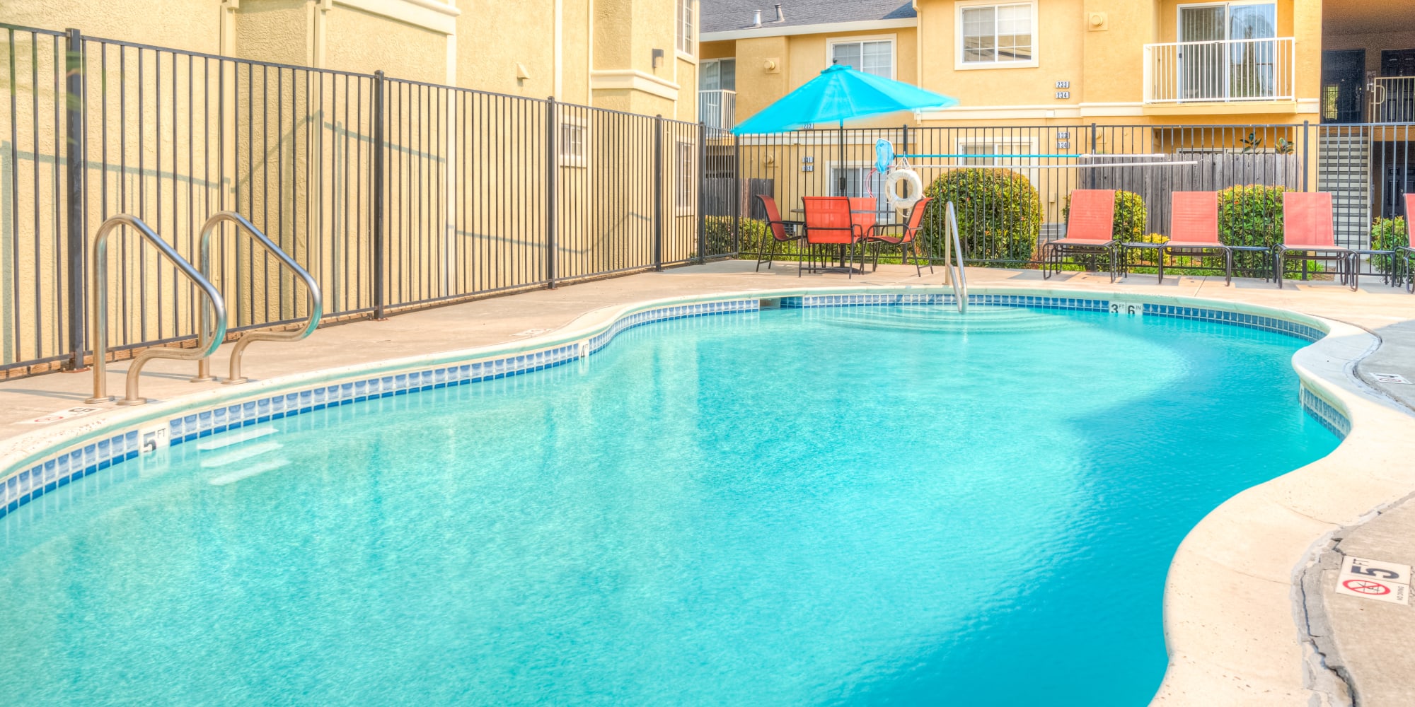 Pool in Pittsburg, California, apartments at Creekside Village Senior Apartment Homes