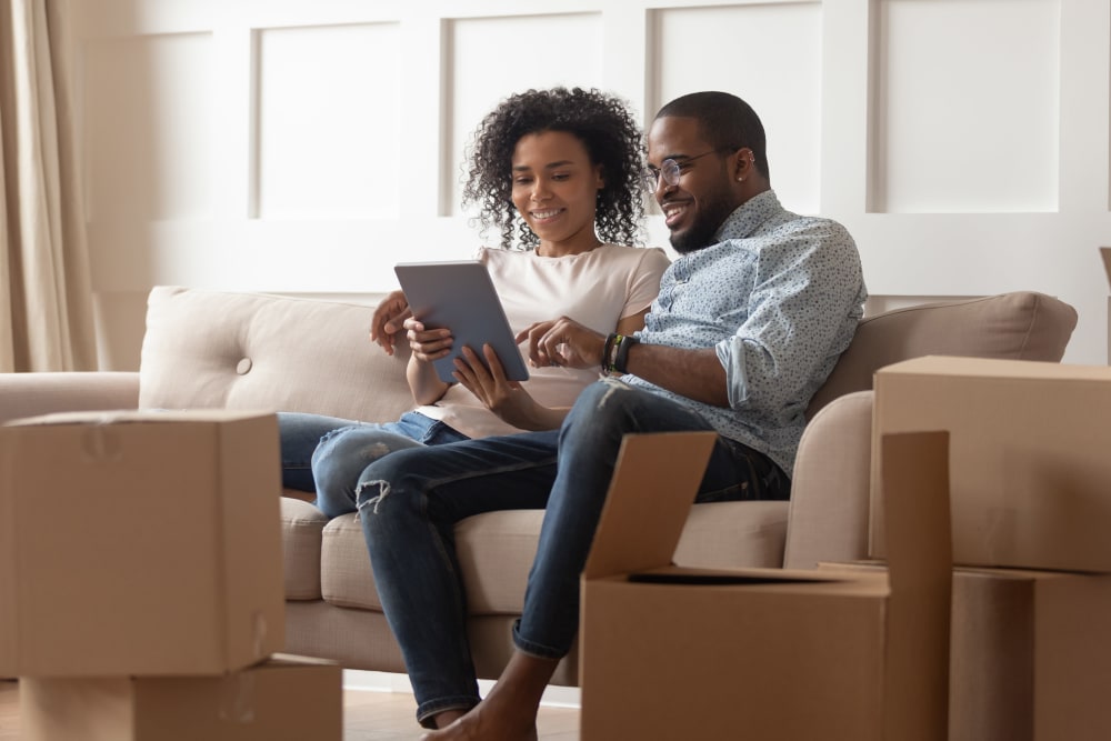 A couple renting a unit online at East Vancouver Self Storage in Vancouver, Washington