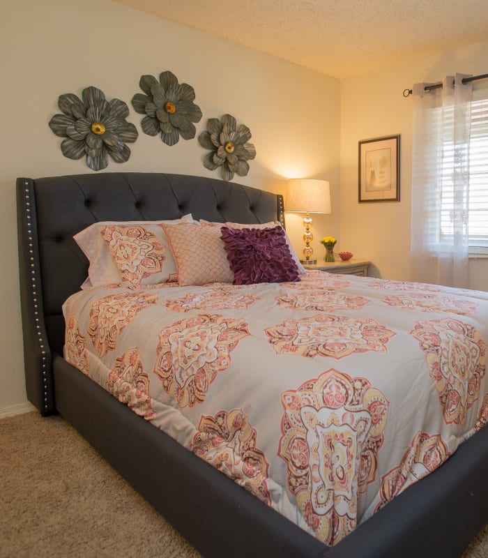 Chic bedroom with ceiling fan at Chardonnay in Tulsa, Oklahoma