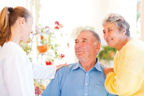 Couple with caregiver at Stonecrest of Louisville in Louisville, Kentucky