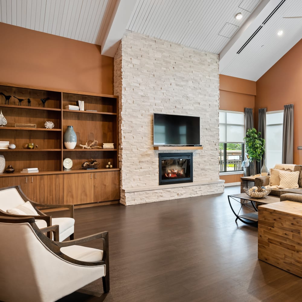 Lounge area with fireplace and TV at Anthology of Mason in Mason, Ohio