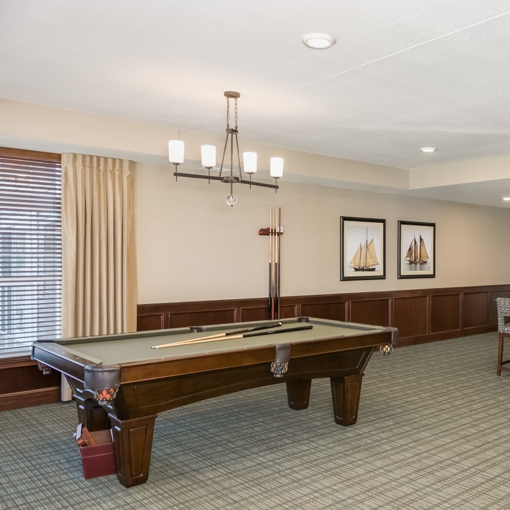 Game room at Applewood Pointe of Roseville at Central Park in Roseville, Minnesota.