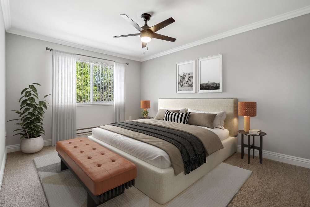 Bedroom with a window at Regency Plaza Apartment Homes in Martinez, California