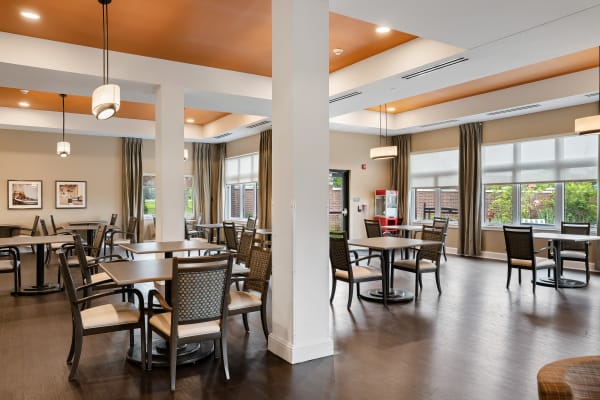 Room with large windows, tables, and many chairs at Anthology of Mason in Mason, Ohio