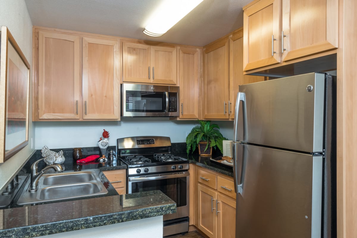 Kitchen with stainless-steel appliances at River Ranch, Simi Valley, California