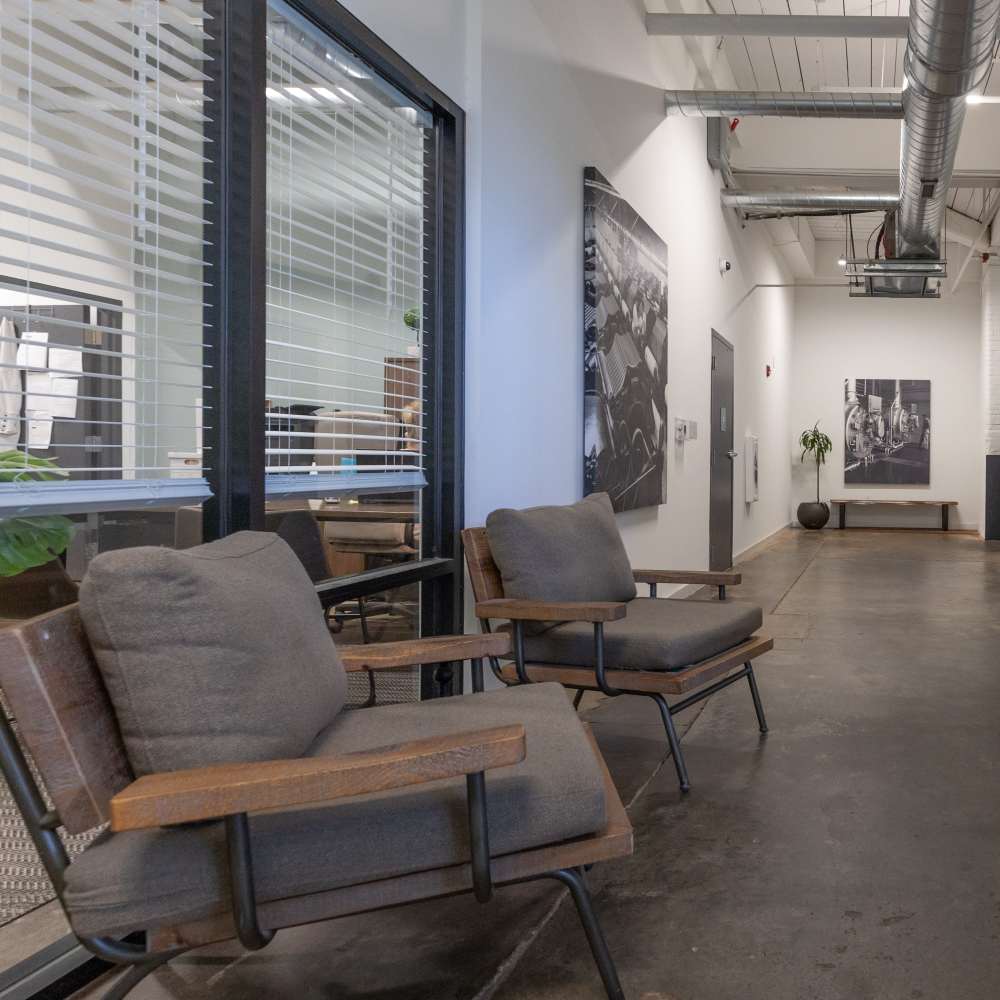 Cozy seating area of the community room at Lofts at Inman Mills in Inman, South Carolina