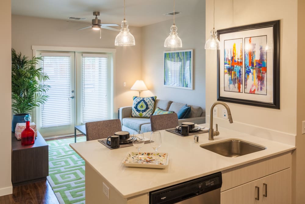 Kitchen and living areas of a model home at Capitol Flats in Santa Fe, New Mexico