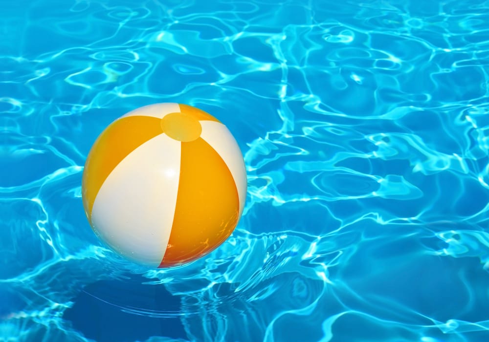 Beach ball sitting on the pools surface at Fusion in Jacksonville, Florida