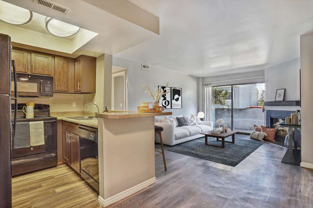 Kitchen with view to living room at Royal Farms Apartments in Salt Lake City, Utah