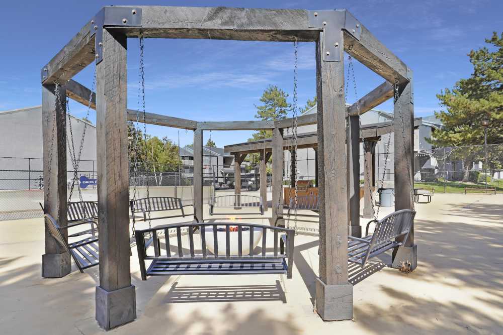 Firepit  with swings at Royal Farms Apartments in Salt Lake City, Utah