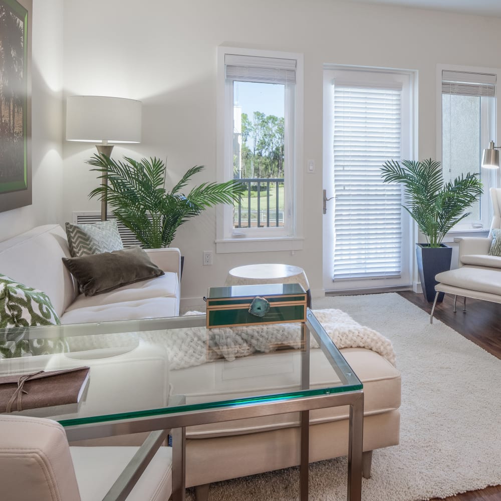 Bright, comfortable living room at All Seasons Naples in Naples, Florida