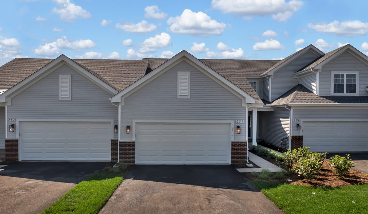 Homes with attached garages at Home at Ashcroft in Oswego, Illinois