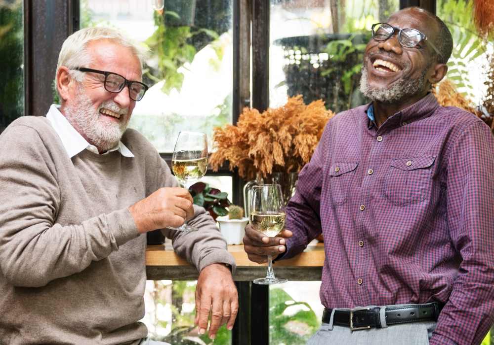 Two friends enjoying wine at The Leonard on Beverly in Los Angeles, California
