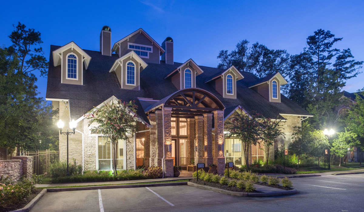 Exterior shot of the apartment in the night at Whispering Pines Ranch in The Woodlands, Texas