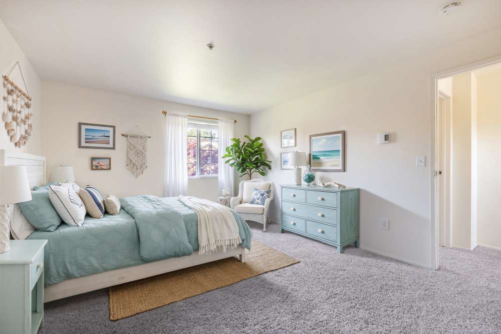 Bedroom with bright walls at Renaissance at 29th Apartments in Vancouver, Washington