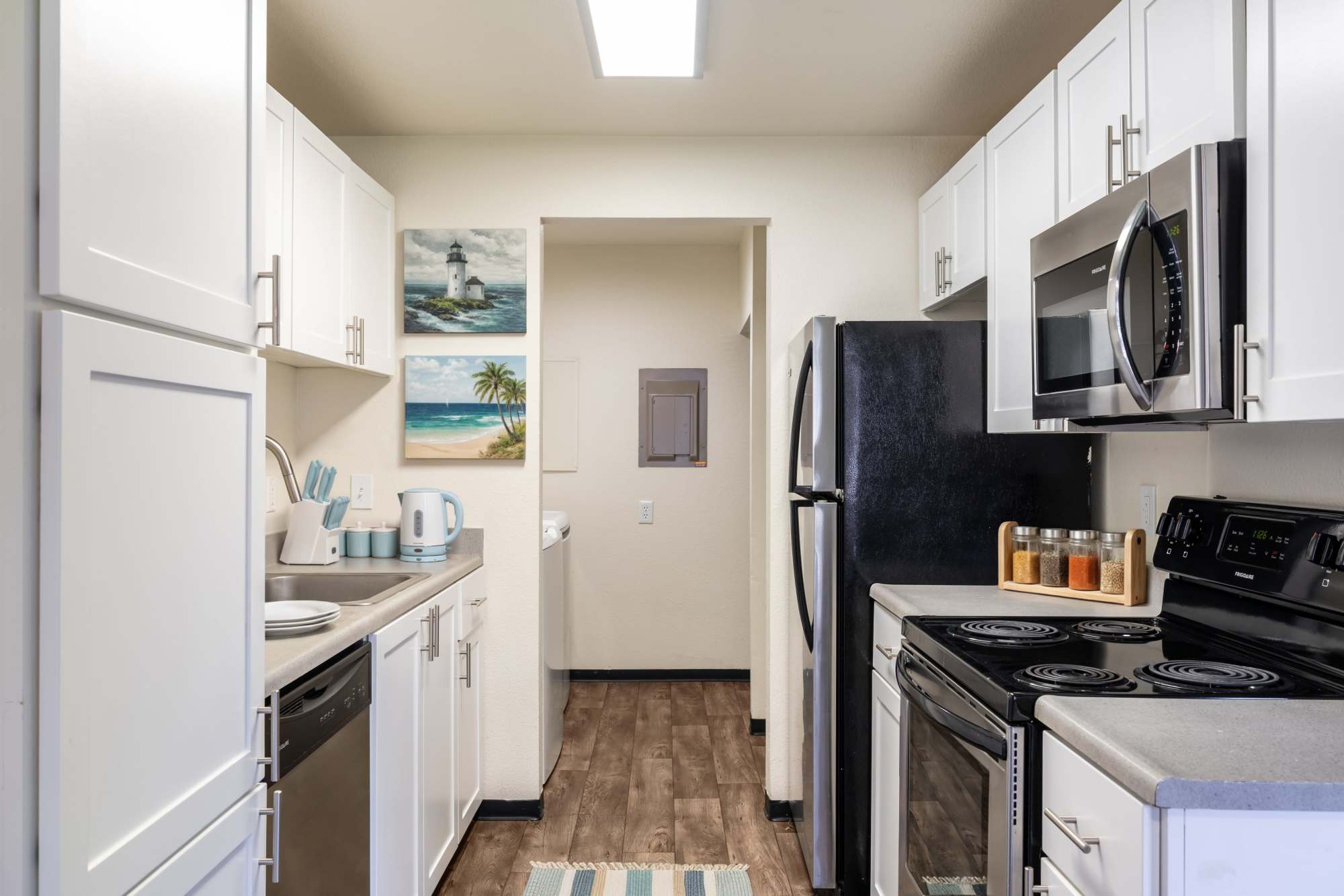 Apartment kitchen with stainless-steel appliances at Renaissance at 29th Apartments in Vancouver, Washington
