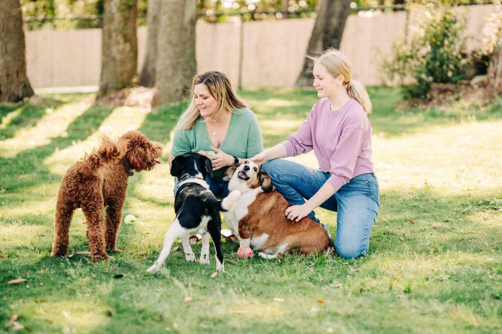 Residents and pets having a playtime at a park near The Flats at Ransley in Pensacola, Florida