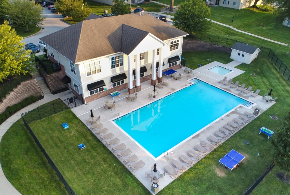 Aerial view of the swimming pool at Stonegate at Devon Apartments in Devon, PA
