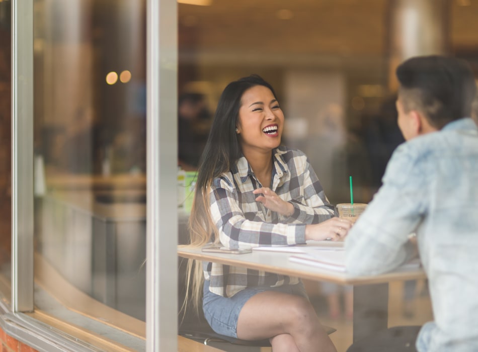 Residents enjoying coffee and good conversation at a café near Terra Martinez in Martinez, California
