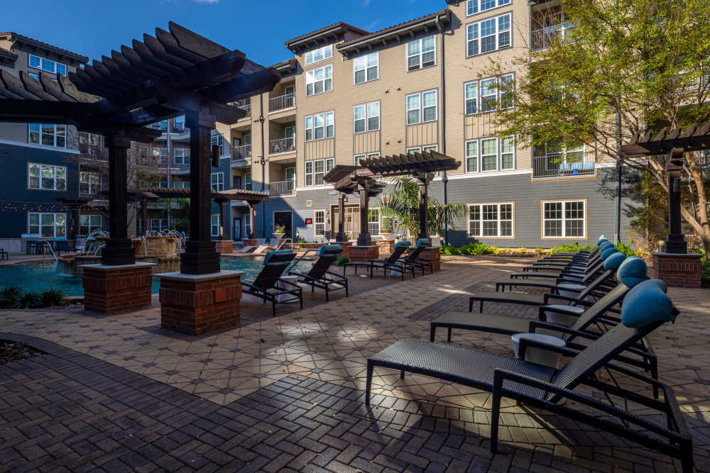 Swimming pool with lounge beds at Whitmore in Houston, Texas