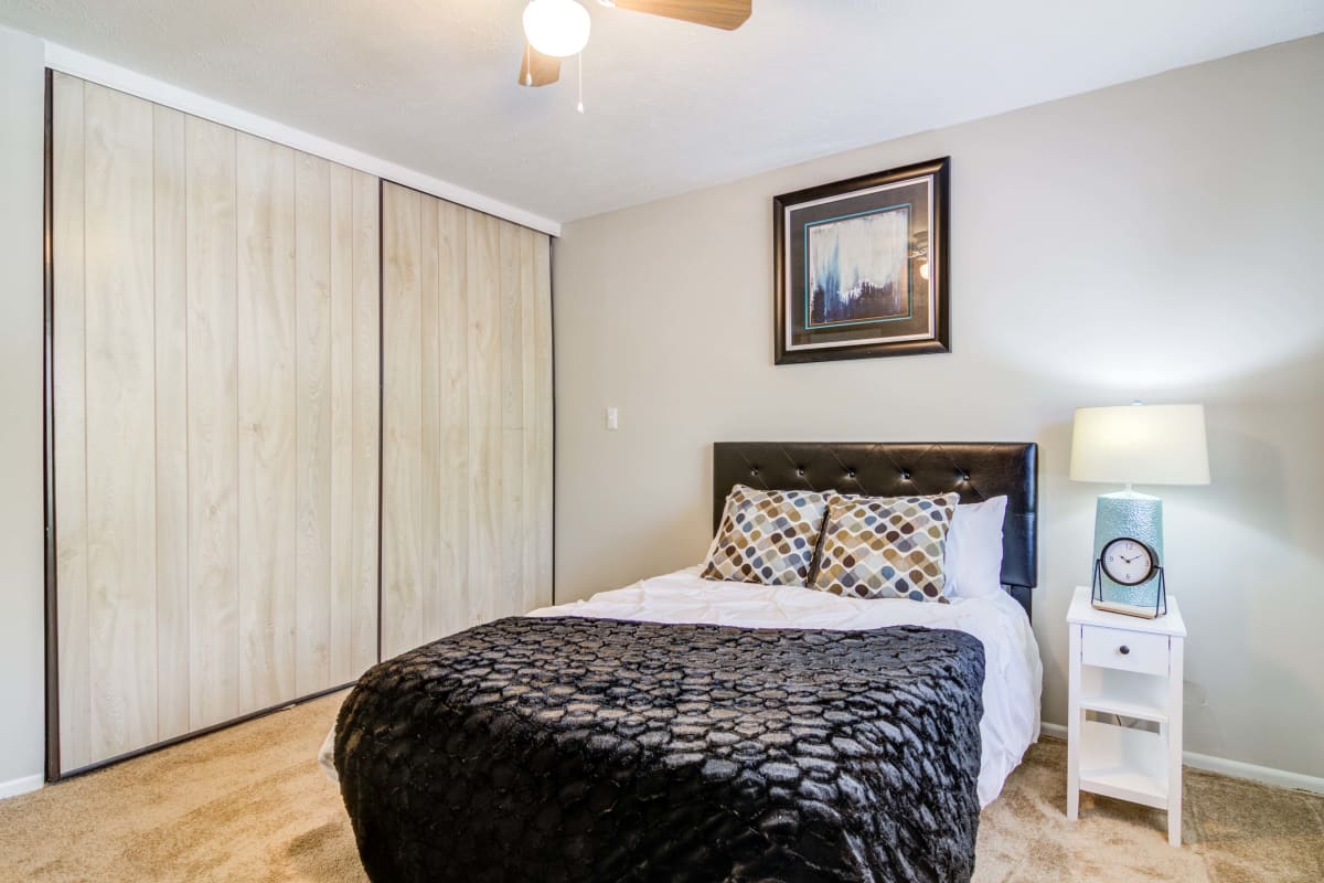 Bedroom with a ceiling fan at Element at 3900 in Macon, Georgia