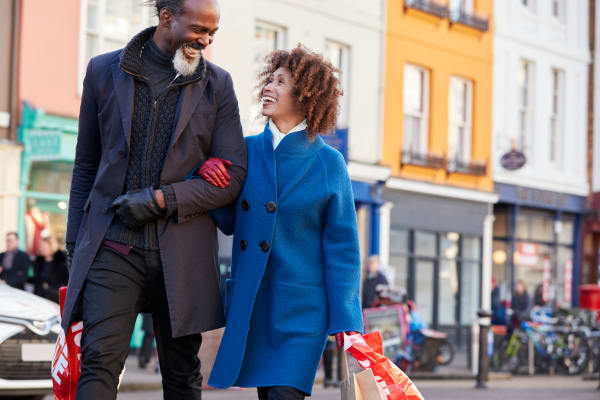 Couple shopping and enjoying a walk near Charlesgate Apartments in Towson, Maryland