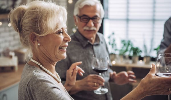 Residents of Anthology of Millis having wine in Millis, Massachusetts