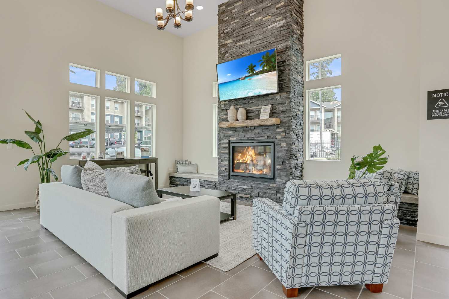 Resident lounge with television and fireplace at Haven Hills in Vancouver, Washington 