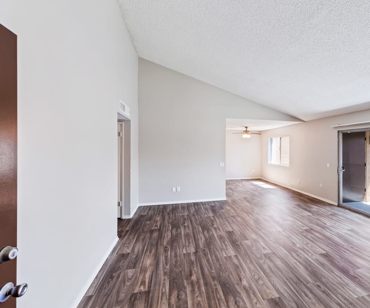 Spacious floor plans with high ceilings and hardwood floors at West Fifth Apartments in Ontario, California