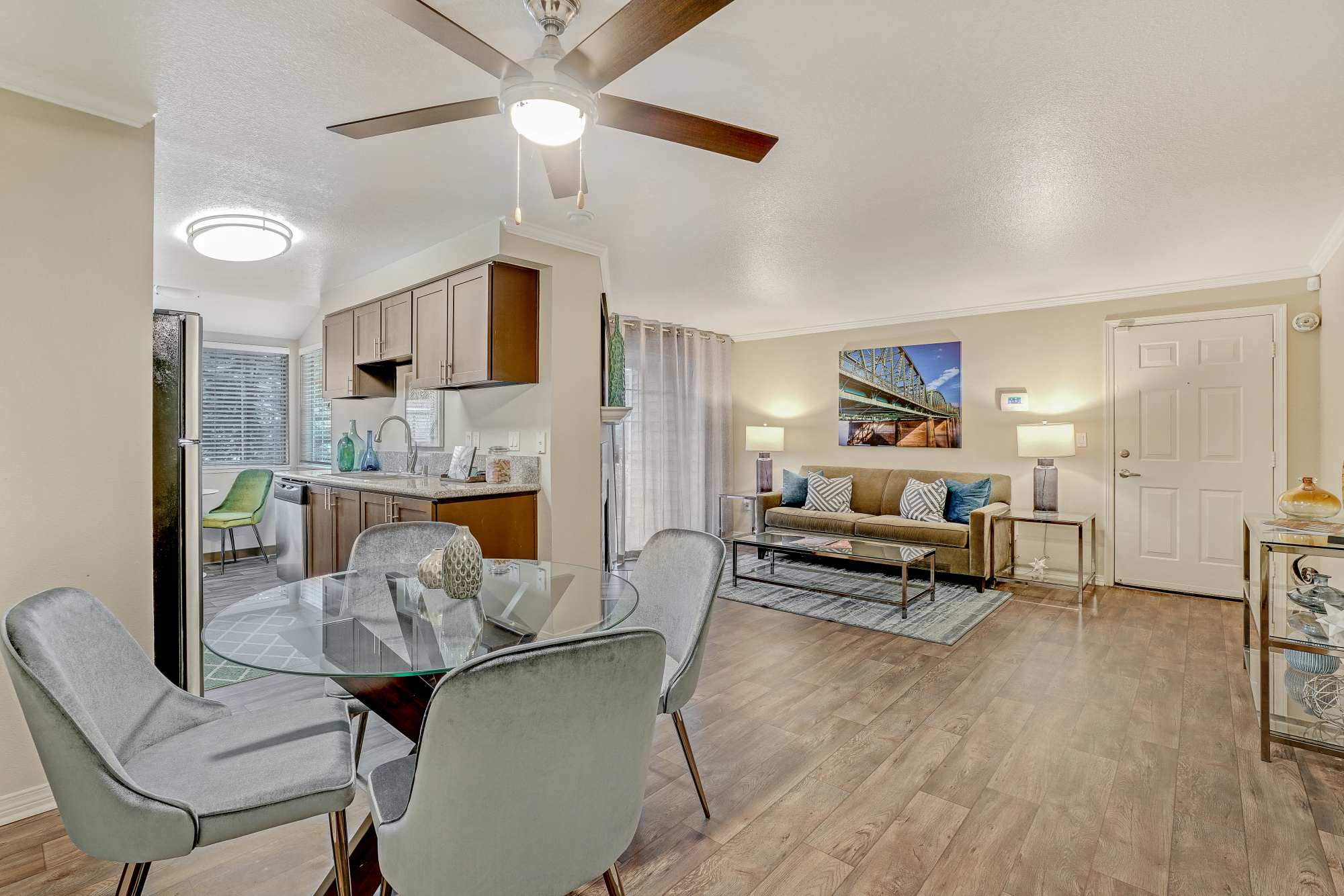 Dining area and living room at Walnut Grove Landing Apartments in Vancouver, Washington