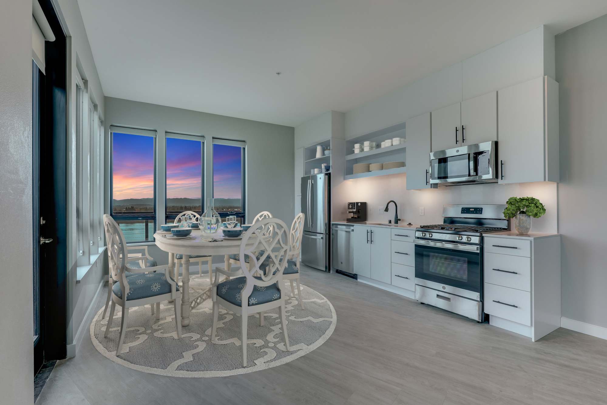Kitchen with dining table and chair at The Columbia at the Waterfront in Vancouver, Washington