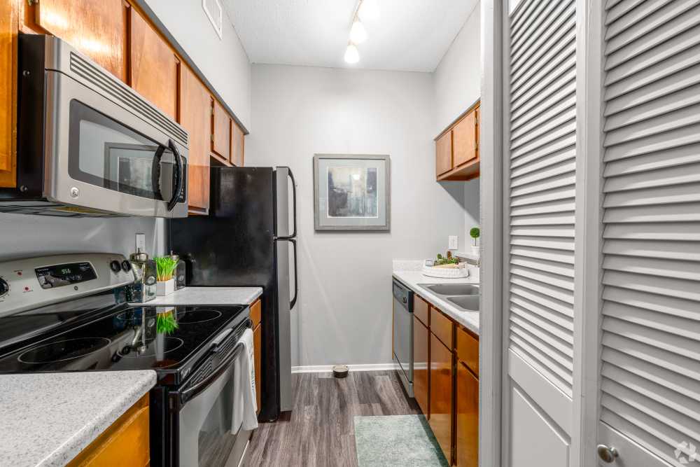 Modern kitchen with all appliances at Madison at Dell Ranch in Round Rock, Texas