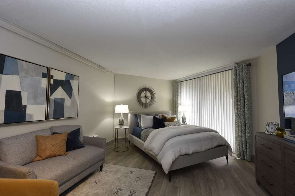 View of sofa and bed from kitchen at Passenger Flats in Chattanooga, Tennessee