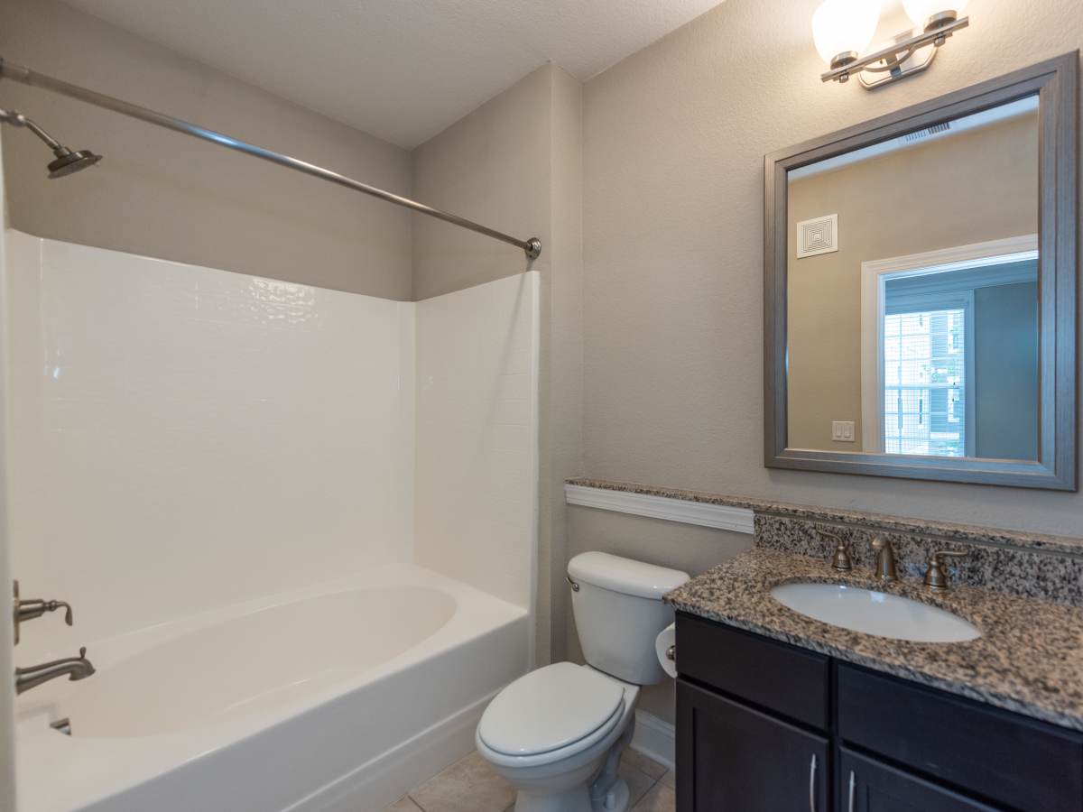 Spacious bathroom with shower and bathtub at Red Knot at Edinburgh in Chesapeake, Virginia